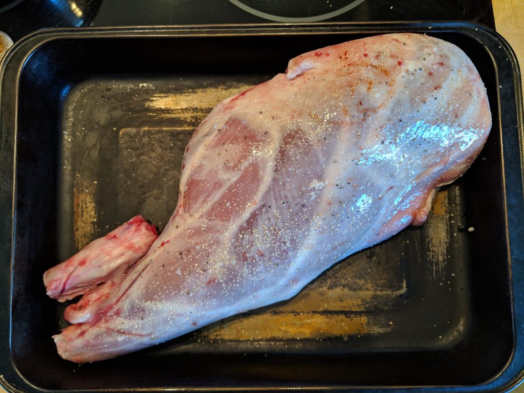 Whole leg of lamb going into the oven
